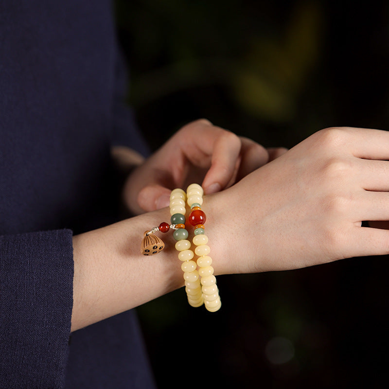 奶油黄玉化菩提算盘珠莲蓬坠手串