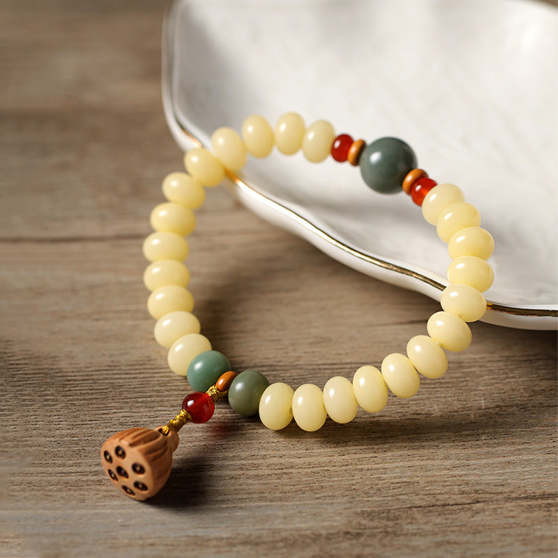 奶油黄玉化菩提算盘珠莲蓬坠手串