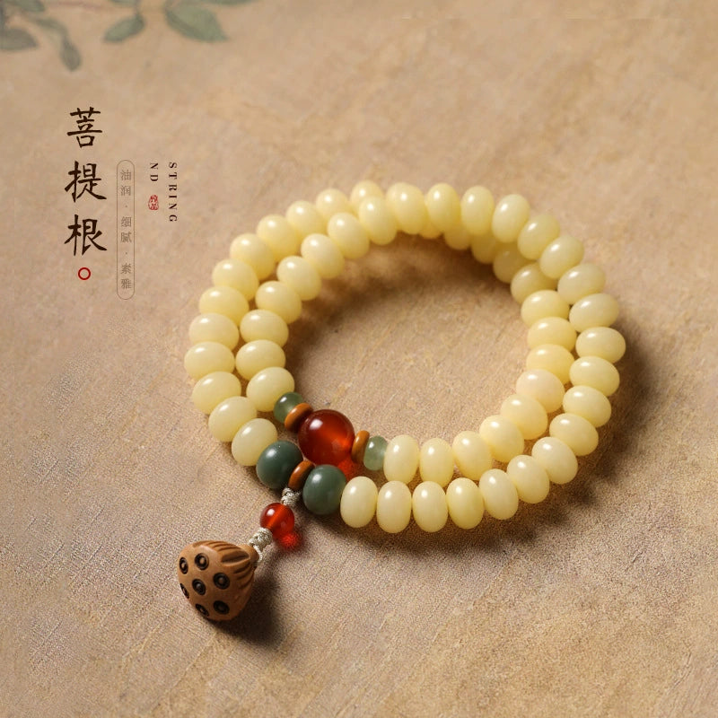 奶油黄玉化菩提算盘珠莲蓬坠手串